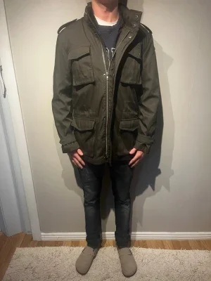 Mörkgrön field jacket