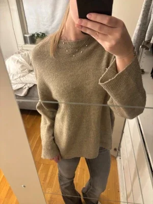 Beige stickad tröja 157 S
