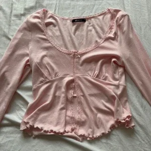 Rosa långärmad topp
