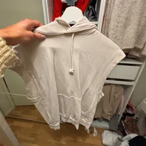Beige ärmlös hoodie från hm