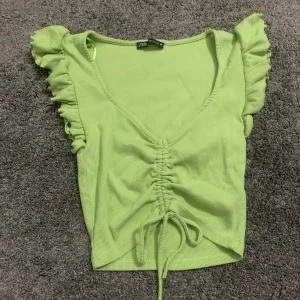 Grön crop top linne