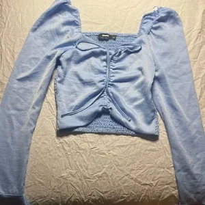 Blå bluse