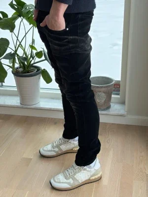 Svarta skinny jeans herr