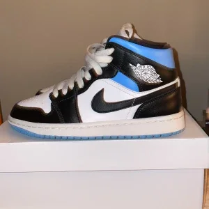 Jordan 1 mid royal black and blue