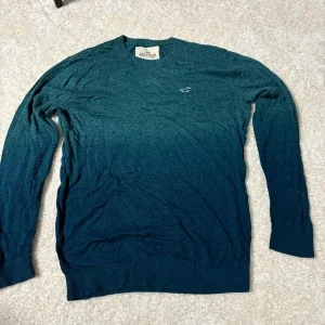 Blå stickad tröja från Hollister
