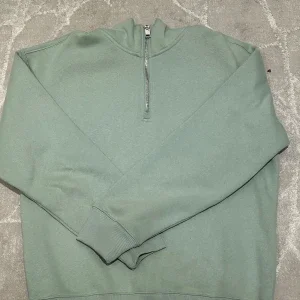 Grön half zip sweatshirt från H&M
