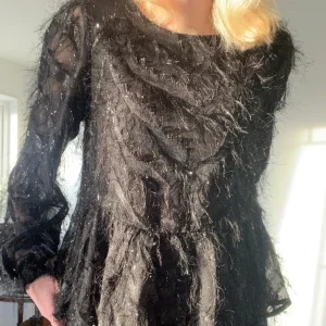 Glittrig topp