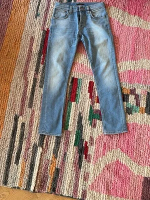 Ljusblå jeans från Nudie Jeans