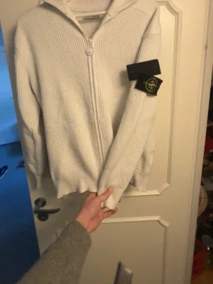 Vit stickad ziptröja Stone Island
