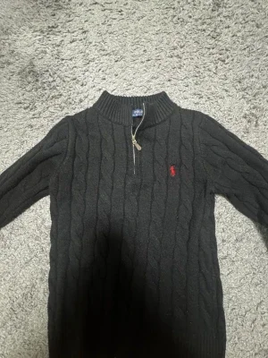 Svart polo halfzip
