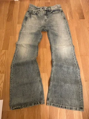 Balenciaga lost tape flared jeans - XS