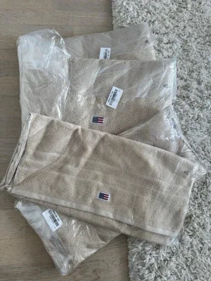Beige handduk Lexington bomull