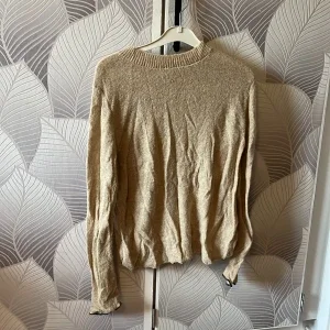 Beige stickad tröja från Zara