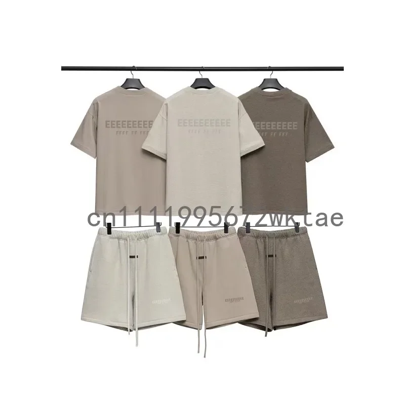 AliExpress - 2SP Klassiek merk Hoogwaardige heren T-shirts Sets Luxe ontwerp Metallic textuur Letter Katoenen T-shirt Paar losse shorts Pak