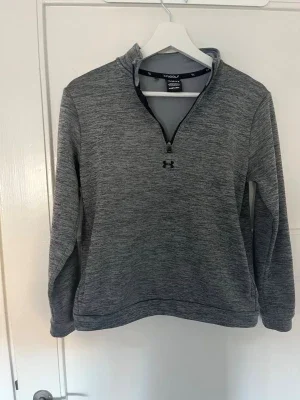 Golf tröja Grå halvzip tröja från Under Armour