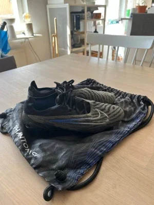 Nike Phantom GX fotbollsskor svart/grå