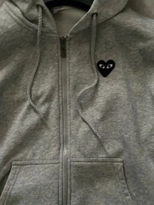 CDG Play Zip Hoodie Comme Des Garcons