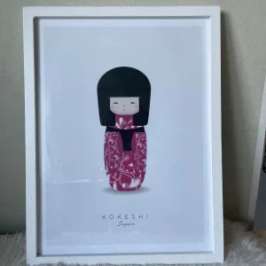 Kokeshi Japan affisch i vit ram