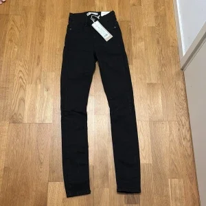 Svarta Molly high waist jeans XS