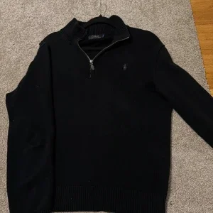 Svart stickad half zip från Polo Ralph Lauren