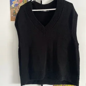svart sweater vest