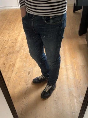 Mörkblå slim fit jeans Levis