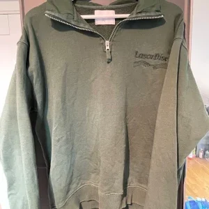 Grön half zip sweatshirt från Vailent