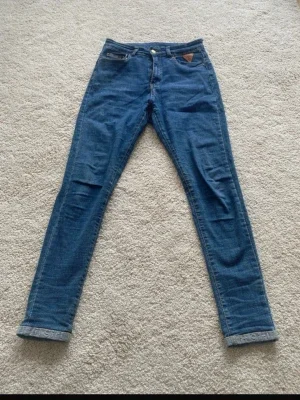 Blå skinny jeans