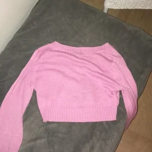 Rosa stickad tröja från H&M Divided