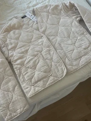 Quilted jacket - Beige