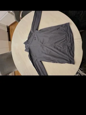 Grå zip-tröja från Under Armour (Äkta