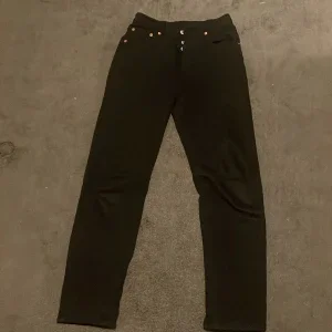 Svarta Levis 501 jeans