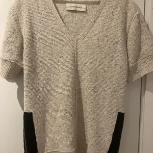 Beige stickad tröja från By Malene Birger