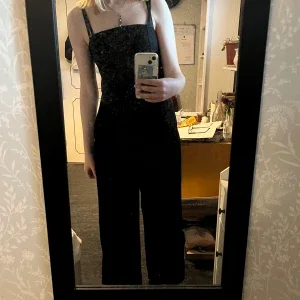 svart jumpsuit
