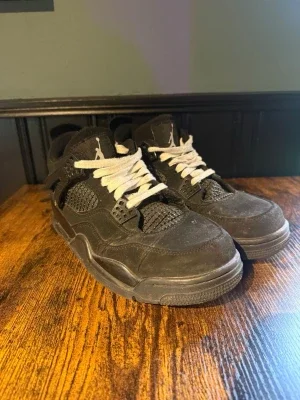 Jordan 4 black cat sneakers