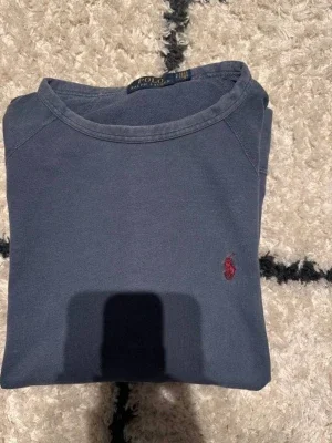 Blå stickad tröja från Polo Ralph Lauren