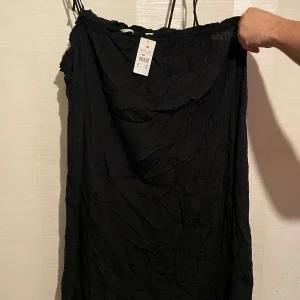 Härlig svart luftig klänning. Strl 3XL XXXL