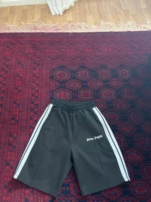 Palm Angels svarta skorts med vita ränder