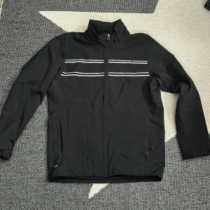 Svart vindjacka/ golfjacka från Cross Sportswear