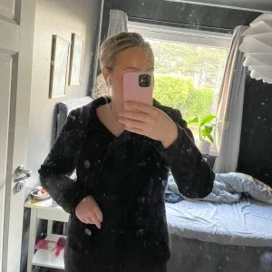 Svart kappa