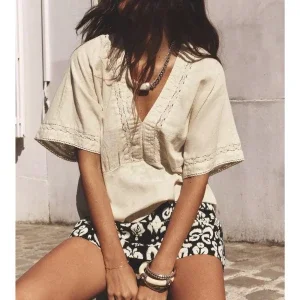 Linne blus med spetsdetaljer från Zara
