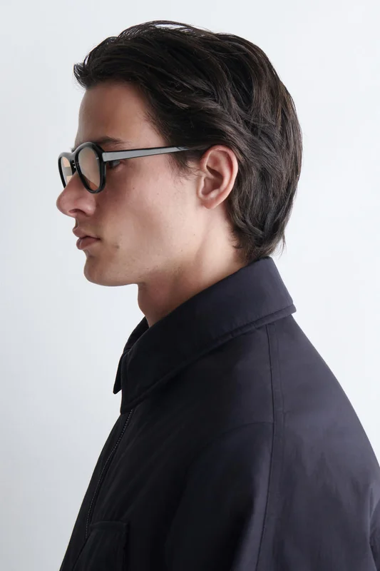 COS Homme Lunettes De Soleil Ovales in Noir