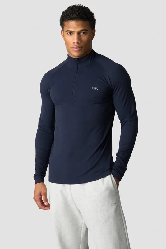 ICANIWILL - Essential Seamless 1/4 Zip Long Sleeve M Navy - Träningströja - Herr - Träningskläder från ICIW