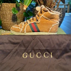 Gucci Hi-Top Teddy Sneakers Brown