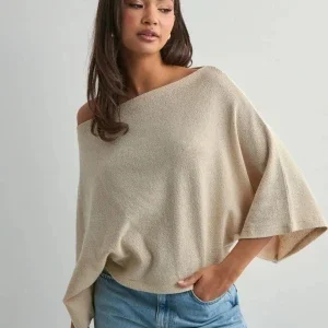 stickad Poncho Nelly