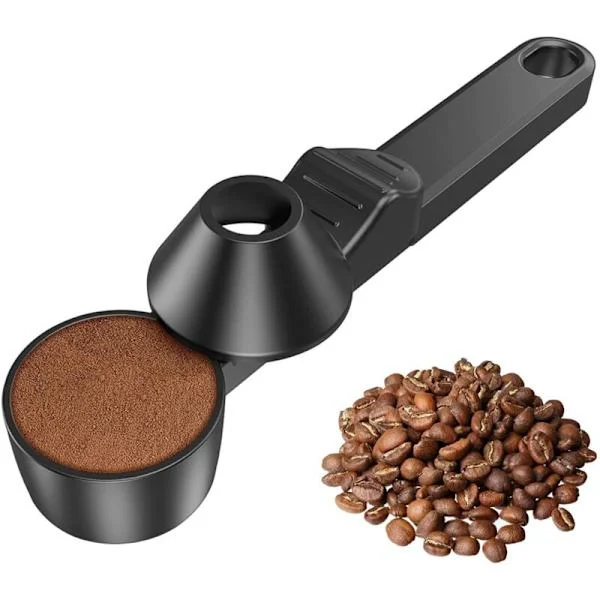 Kahvimitta suppilolla jauhetulle kahville. 30 ml - Musta kahvilusikka uudelleentäytettäville kapseleille. Proteiinijauhe ja tee