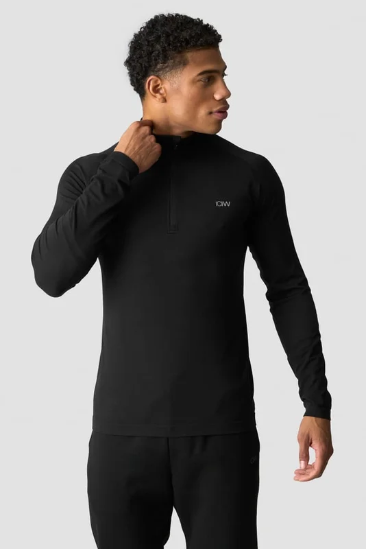 ICANIWILL - Essential Seamless 1/4 Zip Long Sleeve M Black - Träningströja - Herr - Träningskläder från ICIW