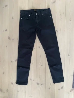 Svarta slim byxor J.Lindeberg