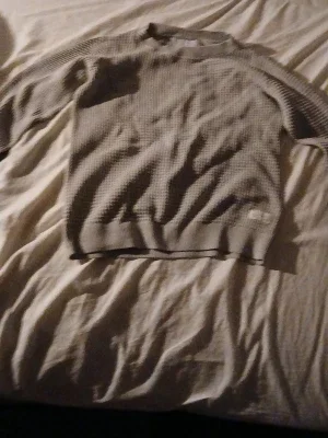 Grå ribbad tröja från Carhartt
