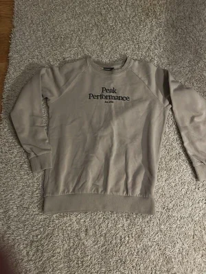 Beige sweatshirt från Peak Performance